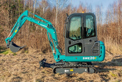 Sunward SWE-20F Mini Excavator at Work: A yellow and black compact excavator with hydraulic arm extended, digging into the ground at a construction site.